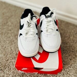 Nike Kids Black and White Sneakers shoes.